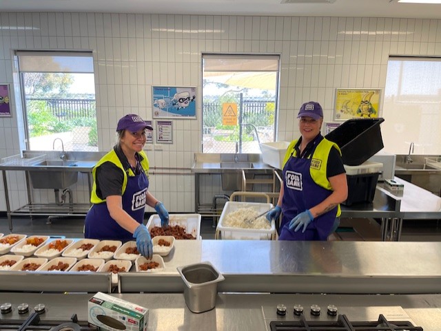 Perth team volunteering at Foodbank Australia. 