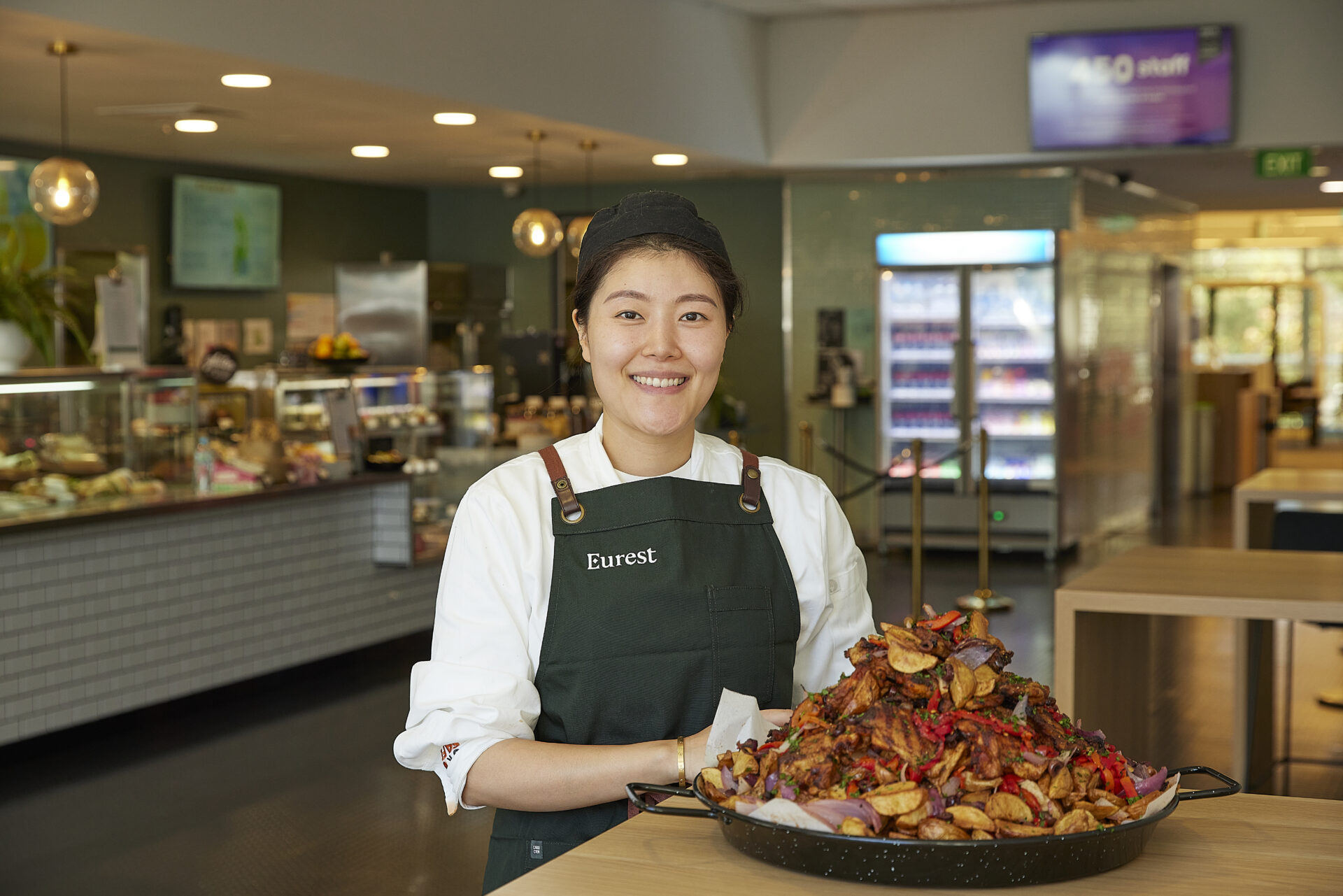 Eurest team member with a dish